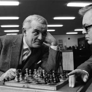 A 1969 Print of actors in a chess game confrontation