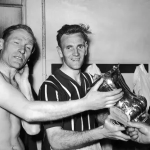 FA Cup Final at Wembley. Manchester City players Bert Traumann and Don Revie with the Cup