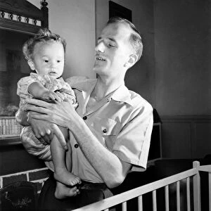 Families. Father and baby boy. July 1953 D3424