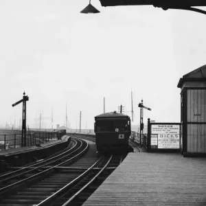 The famous Overhead Railway in Liverpool, with the train stopped at James Street Station The famous Overhead Railway in Liverpool, with the train stopped at James Street Station