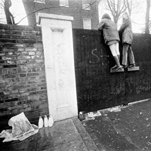Fans climb up Paul McCartneys front gates of his St Johns Wood