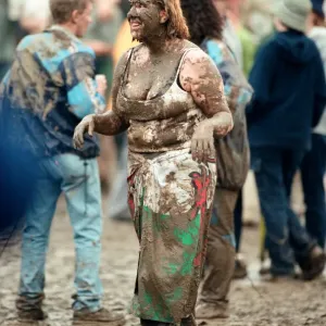 Fans covered in mud, at Margam Park to watch Catatonia performing, South Wales Fans covered in mud, at Margam Park to watch Catatonia performing, South Wales