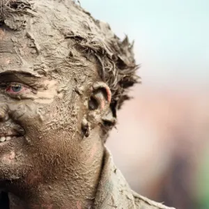 Fans covered in mud, at Margam Park to watch Catatonia performing, South Wales Fans covered in mud, at Margam Park to watch Catatonia performing, South Wales