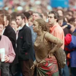 Fans covered in mud, at Margam Park to watch Catatonia performing, South Wales Fans covered in mud, at Margam Park to watch Catatonia performing, South Wales