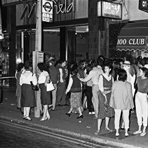 Fans gather outside the 100 club in Oxford Street, London, England
