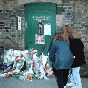 Fans gather outside the Kensington, West London, home of singer Freddie Mercury who died Fans gather outside the Kensington, West London, home of singer Freddie Mercury who died