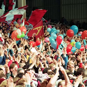 Fans in the Holte End stand in the final game before it was demolished