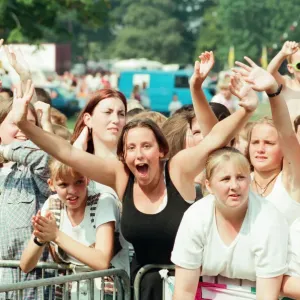 Fans of Peter Andre, cheer as he performs at Fun Day, Stewart Park, Marton, Middlesbrough