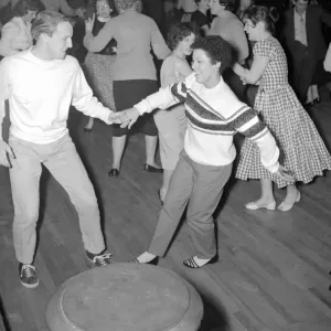 Fans of Rock n roll singer Bill Haley dance to his music as he performs with his band Fans of Rock n roll singer Bill Haley dance to his music as he performs with his band