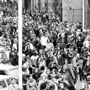 Fans and supporters of Radio One DJ Diddy David Hemilton throng around the precinct in