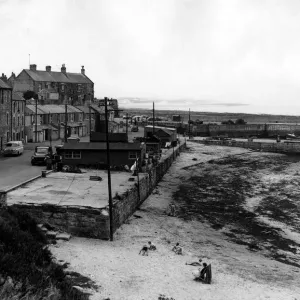 Far from the crowded beaches, this peaceful scene at the coastal village of Seahouses Far from the crowded beaches, this peaceful scene at the coastal village of Seahouses