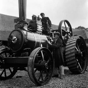 Farmer Crithus Nappes wins the tractor engine race from his friend Miles Chetwyrd Farmer Crithus Nappes wins the tractor engine race from his friend Miles Chetwyrd
