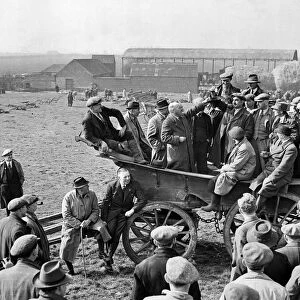 Farmers balloting for farm implements during the Second World War. 21st March 1943