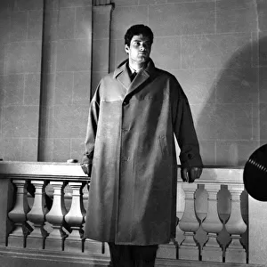 Fashion 1940 s: Male mannequin Christian Marquant wears a water-proof coat that can