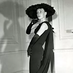 Fashion 1950s - The Hoop-la-line - August 1957 in black silk crepe
