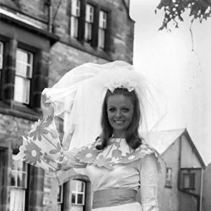 Fashion 1960 s: Here comes the Bride in Paper. Confetti is thrown away at weddings