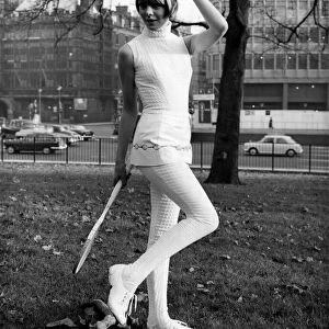Fashion 1960s. So cool for court cats. What will the wall-dressed tennis girl be wearing