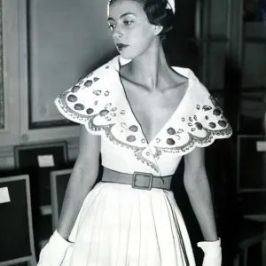Fashion clothing shoot March 1949 The new plunge neckline from Paris Plunging Fashion clothing shoot March 1949 The new plunge neckline from Paris Plunging