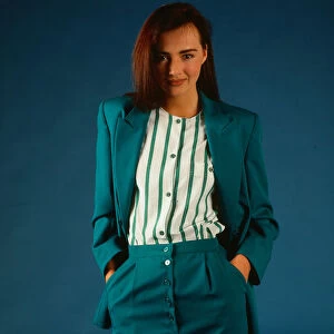 Fashion female suits 1988 Model wearing turquoise suit