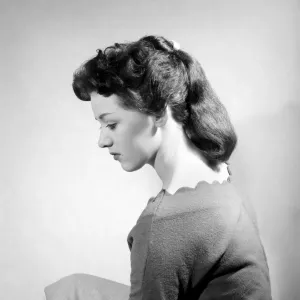 Fashion: Hair styles by Raymond. April 1956 B475-007