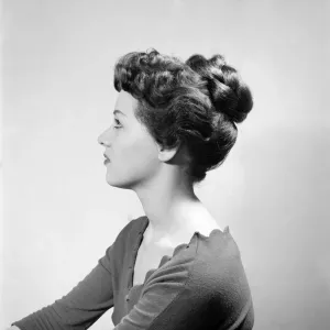 Fashion: Hair styles by Raymond. April 1956 B475-011