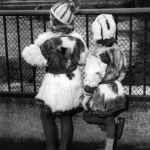 Fashion. Never mind the weather. Here are two young visitors to London who couldn