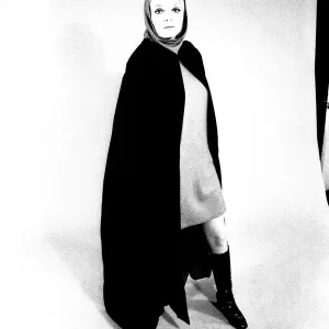 A fashion shoot from 13 April 1970 - A model wears a cloak and knee lenght boots A fashion shoot from 13 April 1970 - A model wears a cloak and knee lenght boots