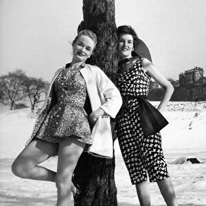 Fashion. Snow everywhere but for these two girls it might as well be spring