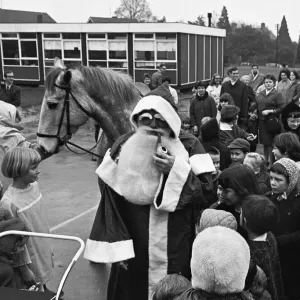 Father Christmas arrives on horseback at Woodley School 30th November 1968 Father Christmas arrives on horseback at Woodley School 30th November 1968