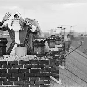 Father Christmas on rooftops, in Middlesbrough. Circa 195 Father Christmas on rooftops, in Middlesbrough. Circa 195