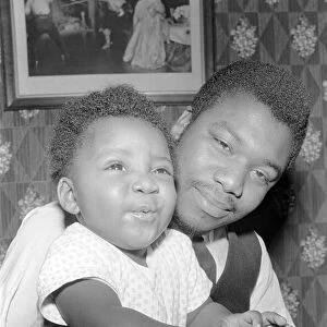 Father with his toddler son. December 1969 Z11609-004