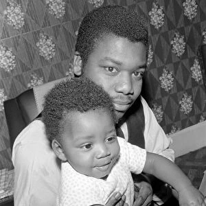 Father with his toddler son. December 1969 Z11609