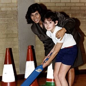 Fatima Whitbread Ex Olympic Champion Javelin Thrower with a child at a Physical