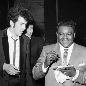Fats Domino with a fan. Saville Theatre, after his performance. 27th March 1967 Fats Domino with a fan. Saville Theatre, after his performance. 27th March 1967