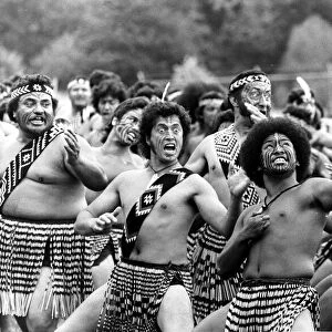 Fearsome Maori warriors put on a traditional dance to welcome Queen Elizabeth II of
