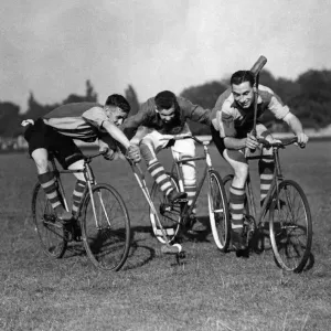 Three fellows playing Cycle polo which was invented in County Wicklow, Ireland