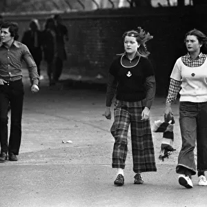 Female football supporters from Salford attends a match at old Trafford