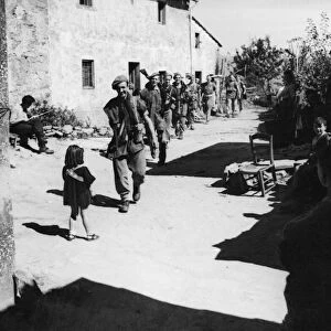 Fifth Army patrol returning to platoon HQ in La Vergine, Italy. September 5th 1944