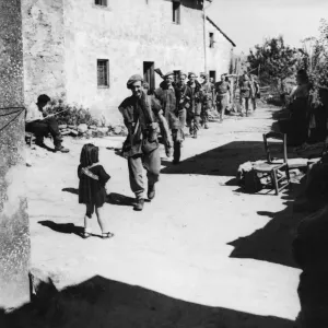 Fifth Army patrol returning to platoon HQ in La Vergine, Italy. September 5th 1944