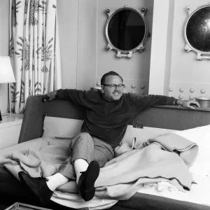 Film and TV star Mickey Rooney in his cabin of the U. S.s United States at Le Havre