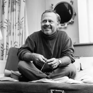 Film and TV star Mickey Rooney in his cabin of the U. S.s United States at Le Havre
