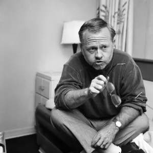 Film and TV star Mickey Rooney in his cabin of the U. S.s United States at Le Havre