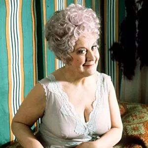 Films Are You Being Served Mollie Sugden Actress puling up negligee to reveal Union
