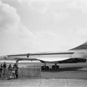 A photograph of Concorde 101 on a short runway at Duxford. Print A photograph of Concorde 101 on a short runway at Duxford. Print