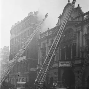 Fire crews tackling a blaze following an air raid, at Taylor Fire crews tackling a blaze following an air raid, at Taylor