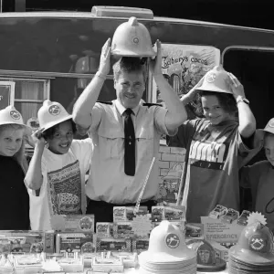 Fireman Paddy Flaherty made sure these youngsters had the right hat of the occasion when