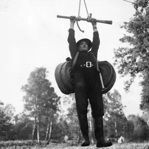 Fireman training commando style. World War Two. Picture taken 7th Fireman training commando style. World War Two. Picture taken 7th