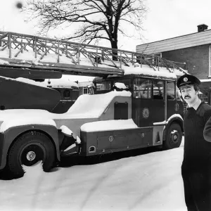 Firemen Brian O Dwyer and Graeme Calder with the turntable ladder machine which is up Firemen Brian O Dwyer and Graeme Calder with the turntable ladder machine which is up