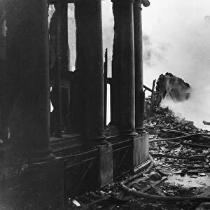 Firemen dampen fires in Paternoster Row following an air raid during Second World War