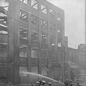 Firemen dampening down the Chamberlain, Kind and Jones factory, Holl0way Head
